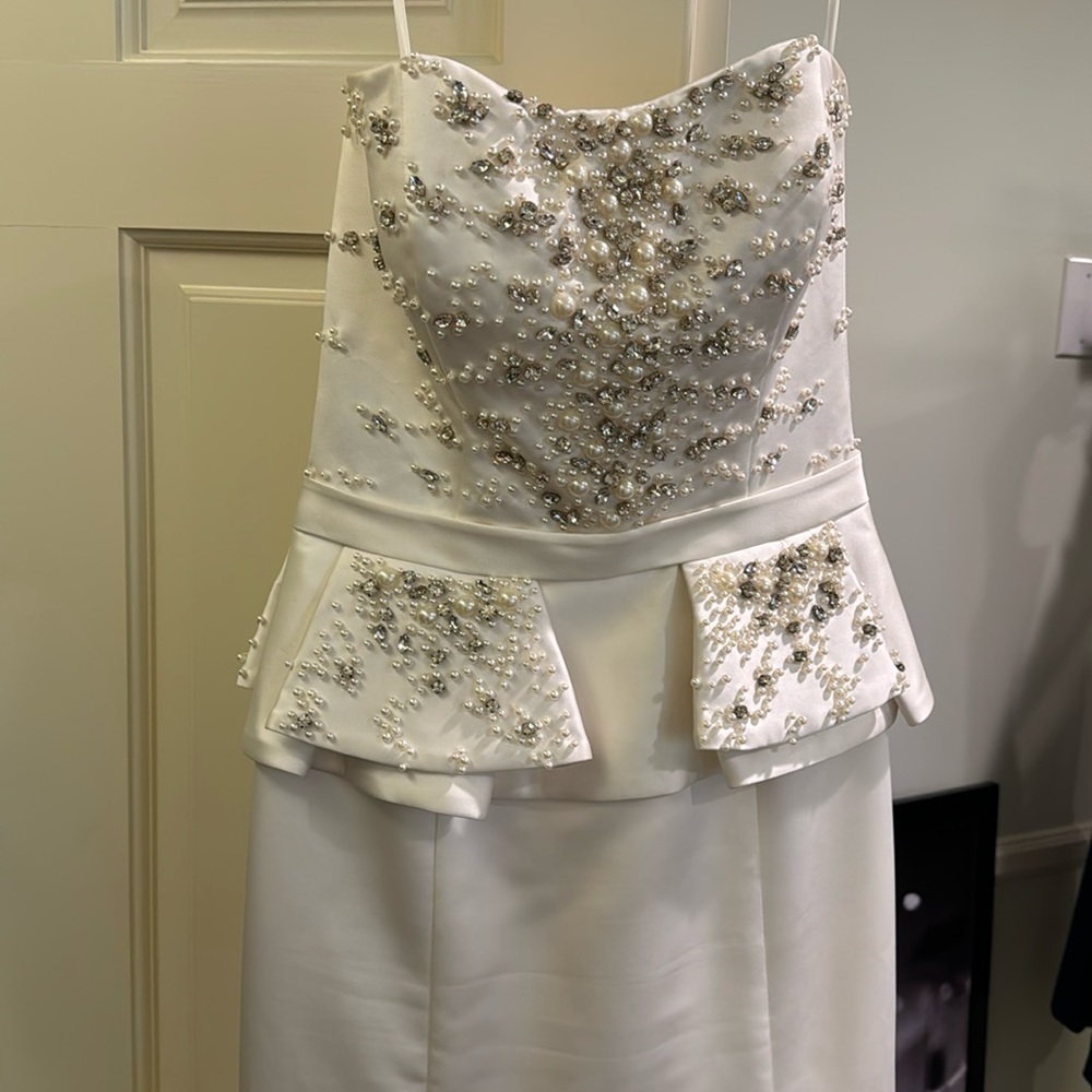 Beautiful white strapless dress with pearls.